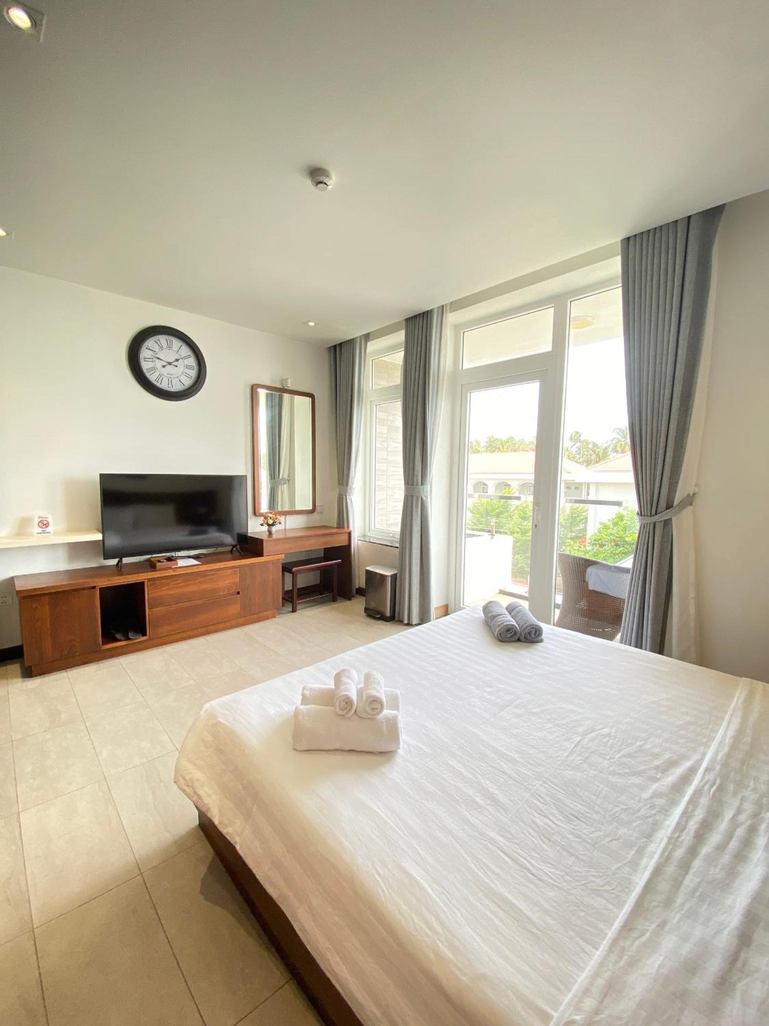 Qli Hotel Mũi Né Buitenkant foto